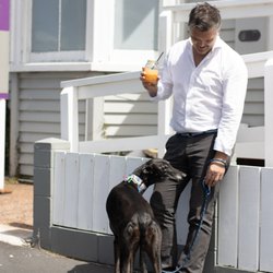 Kingsland Osteo - Royden and Becky taking a break outside the clinic, enjoying a refreshing smoothie on a sunny day.