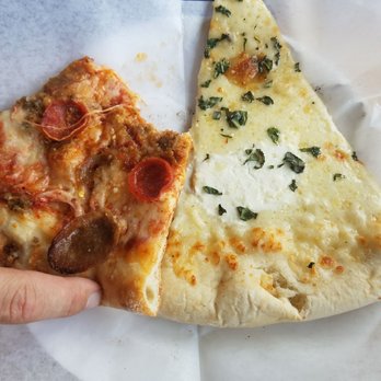 Knockout Pizza - A slice of white pizza and a slice of the porker... we were hungry - Pizza Near Me - Carlsbad, California Knockout Pizza - A slice of white pizza and a slice of the porker... we were hungry - Pizza Near Me - Carlsbad, California