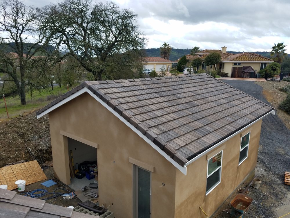 Slide of Trinity Roofing