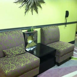 Furniture in the hallway by the elevator - see the modern color scheme? Furniture in the hallway by the elevator - see the modern color scheme?