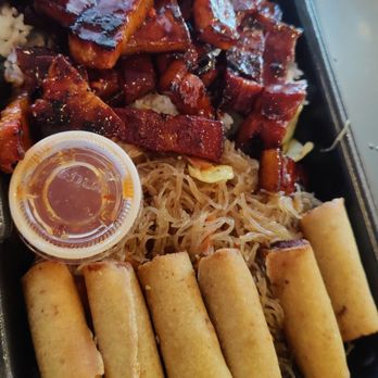 Oming’s Kitchen - Pork Belly + Happy + Substitute Garlic Rice - Filipino Near Me - Las Vegas, Nevada Oming’s Kitchen - Pork Belly + Happy + Substitute Garlic Rice - Filipino Near Me - Las Vegas, Nevada
