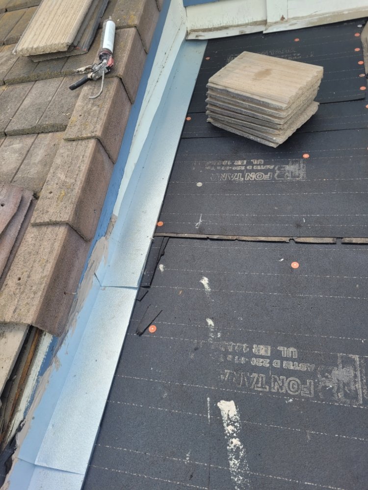 Slide of Hernandez Roofing