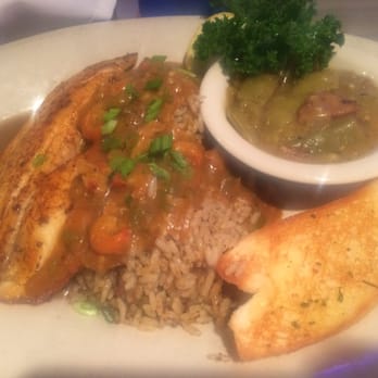 Razzoo's Cajun Cafe - Tricky fishy or something like that. Blackened tilapia with dirty rice and crawfish etouffé and green beans in that cup - Cajun/Creole Near Me - Spring, Texas Razzoo's Cajun Cafe - Tricky fishy or something like that. Blackened tilapia with dirty rice and crawfish etouffé and green beans in that cup - Cajun/Creole Near Me - Spring, Texas