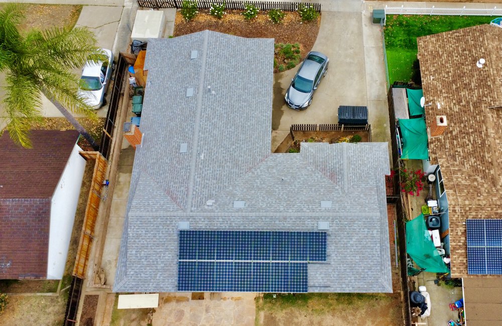 Slide of Dana Logsdon Roofing & Solar