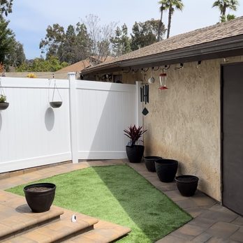Evoscapes - After showing more of the fence and the 3 steps down with bullnose pavers. Still working on the pots and plants. - Landscape Architects or Designers Near Me - San Diego, California