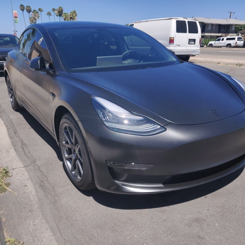 Express Vinyl Wraps - Tesla model 3, satin black wrap. Loyola grey but it's not. - Graphic Design Near Me - Carlsbad, California Express Vinyl Wraps - Tesla model 3, satin black wrap. Loyola grey but it's not. - Graphic Design Near Me - Carlsbad, California