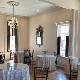 a dining room with tables and chairs a dining room with tables and chairs