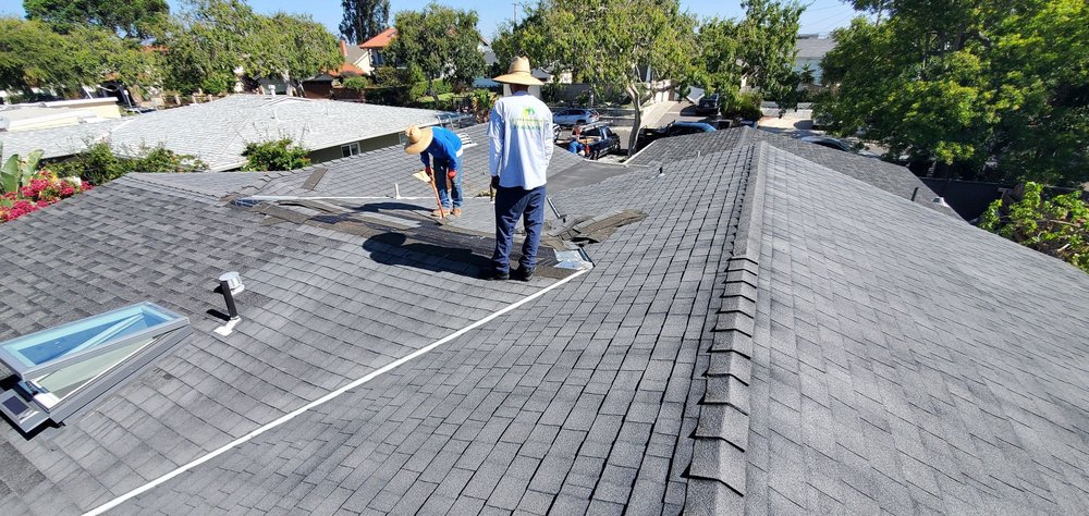 Slide of BD&E Roofing Services