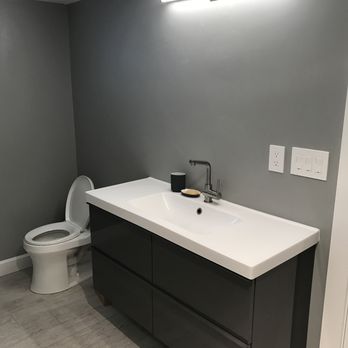 Stella Construction & Home Services - Vanity and toilet - General Contractors Near Me
