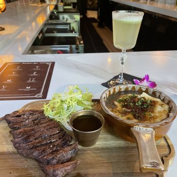 Monarch & Lion - Charcoal Grilled Flat Iron Steak, Chicken Tikka Masala - British Near Me - Chicago, Illinois Monarch & Lion - Charcoal Grilled Flat Iron Steak, Chicken Tikka Masala - British Near Me - Chicago, Illinois