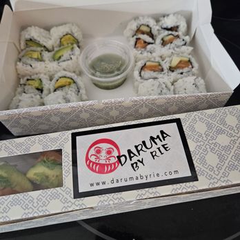 Daruma - Avocado roll on left, salmon roll on right. Sunshine roll in closed box. - Ramen Near Me - Mesa, Arizona Daruma - Avocado roll on left, salmon roll on right. Sunshine roll in closed box. - Ramen Near Me - Mesa, Arizona