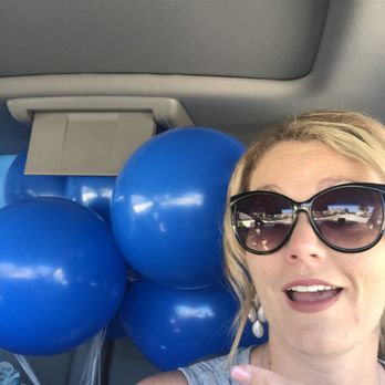 Busy Bee Services - Picking up balloons for a party. - Personal Assistants Near Me