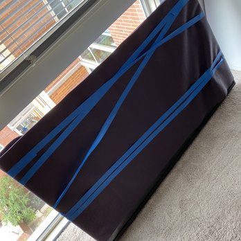 NK Movers - This is how they cover my tv .. WITH MY GYM MAT. And my blue tape  Since they didn't bring enough sheets and tape - Movers Near Me - Herndon, Virginia