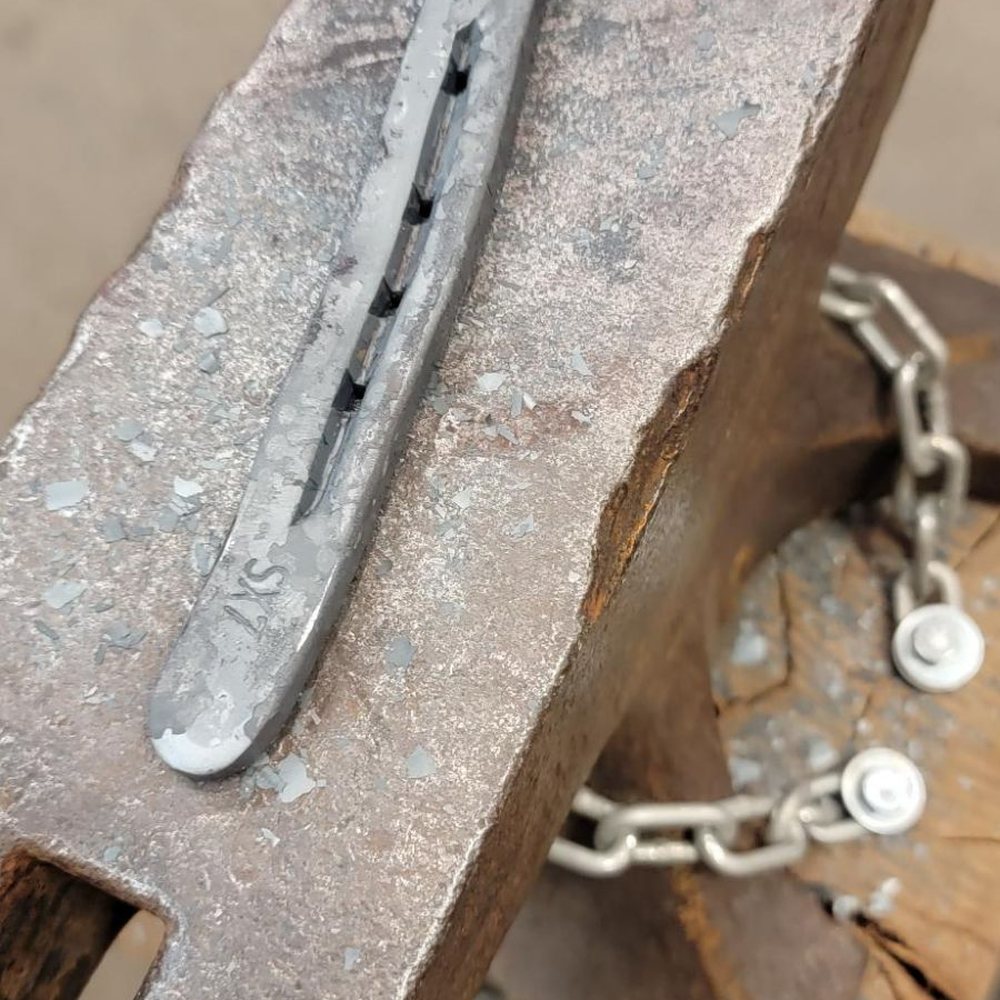 Lawless Forge - Horseshoe knife, after the first step, straightening. - Team Building Activities Near Me - Sterling, Virginia Lawless Forge - Horseshoe knife, after the first step, straightening. - Team Building Activities Near Me - Sterling, Virginia