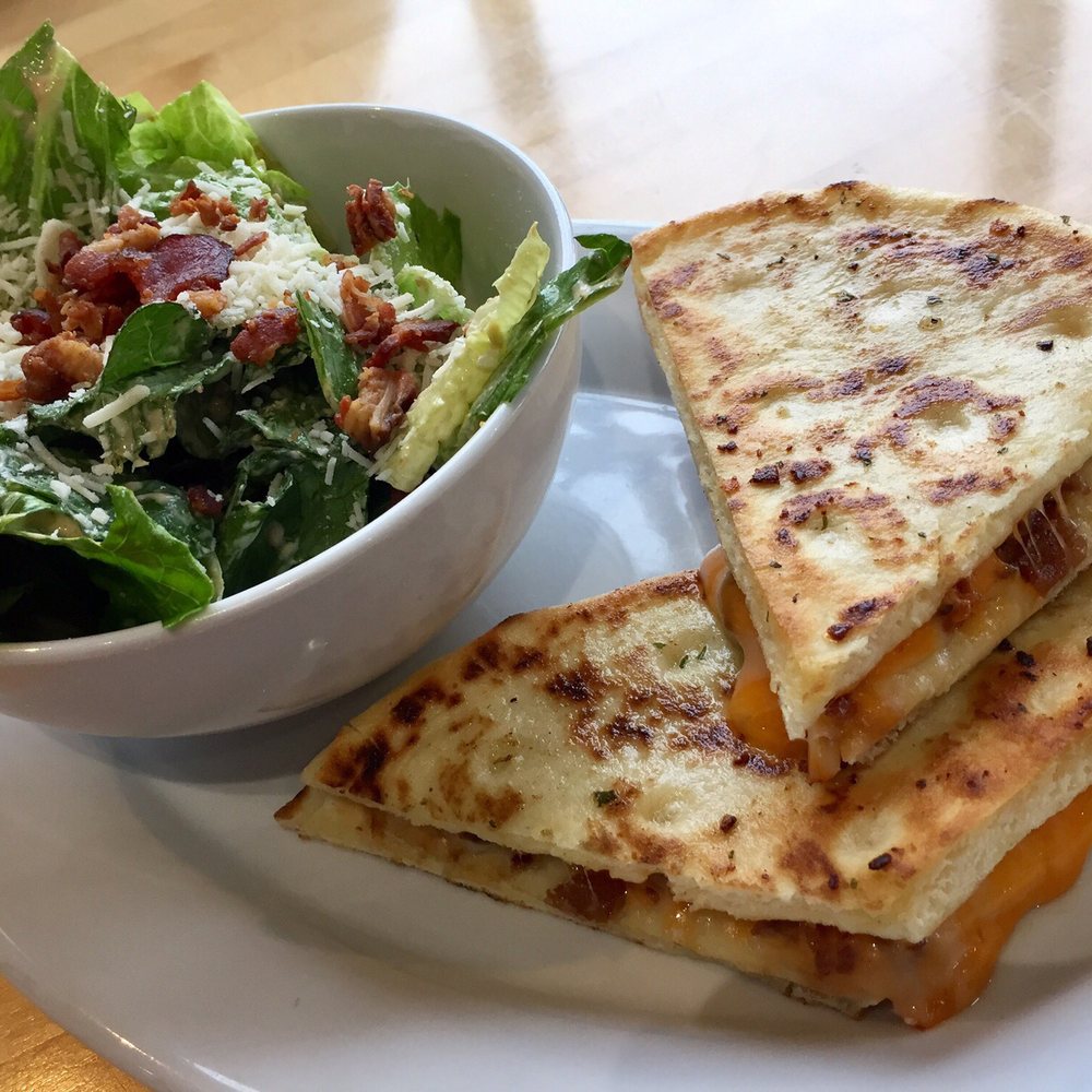 Grilled cheese on naan with chipolte Caesar salad.. $9 something. Grilled cheese on naan with chipolte Caesar salad.. $9 something.