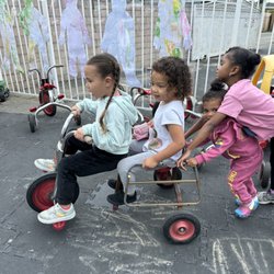 Apple Tree University Preschool - working together on the playground