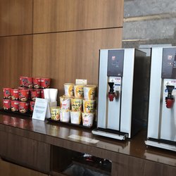 Asiana Airlines - Calling all ramen freaks. On the right wall in Asiana Business Lounge in ICN n is a wall of ramen w/ 2 hot water dispensers