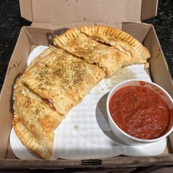 The Pizza Mill & Sub Factory - Pepperoni calzone. Really good. Not a fan of their dipping sauce though. 8.28.2025
