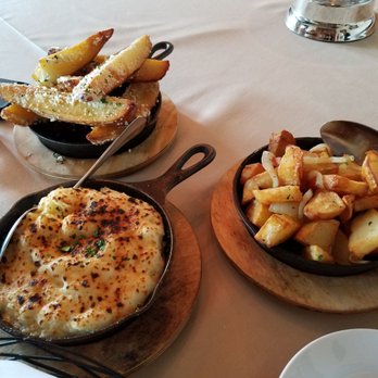 Cotton Calf Kitchen - Mashed potatoes, lyonnaise potatoes and truffle parmesan fries - New American Near Me - Braselton, Georgia Cotton Calf Kitchen - Mashed potatoes, lyonnaise potatoes and truffle parmesan fries - New American Near Me - Braselton, Georgia