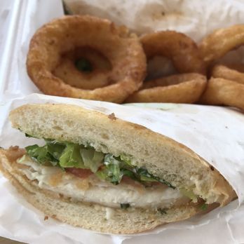 Tommy's Burger Stop - Halibut po boy with onion rings - Burgers Near Me - Anchorage, Alaska Tommy's Burger Stop - Halibut po boy with onion rings - Burgers Near Me - Anchorage, Alaska