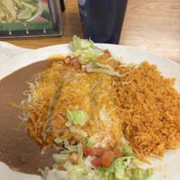 Chicken enchiladas and tamale Chicken enchiladas and tamale