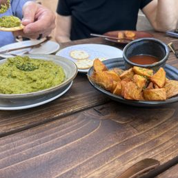 Mushy peas and French fries. Mushy peas and French fries.