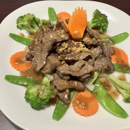 Garlic and pepper beef with steamed rice Garlic and pepper beef with steamed rice