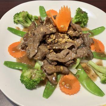 Thai Town Sycamore - Garlic and pepper beef with steamed rice - Thai Near Me - Sycamore, Illinois Thai Town Sycamore - Garlic and pepper beef with steamed rice - Thai Near Me - Sycamore, Illinois