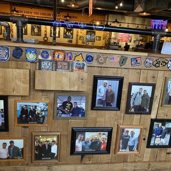 Mission BBQ - a wall full of framed photos - Barbeque Near Me - Dover, Delaware