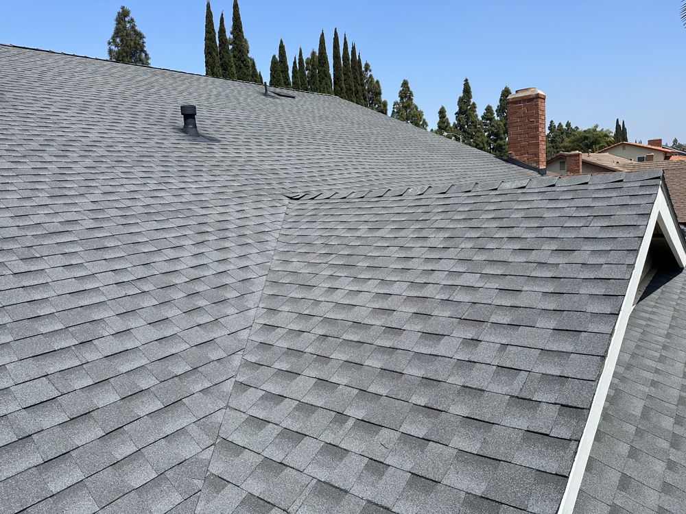 Slide of Rod's Roofing