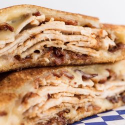 Corner Cafe - Grilled Super Bird. Turkey, Tomatoes, Swiss Cheese, and Bacon