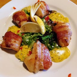 Bacon wrapped scallop special.