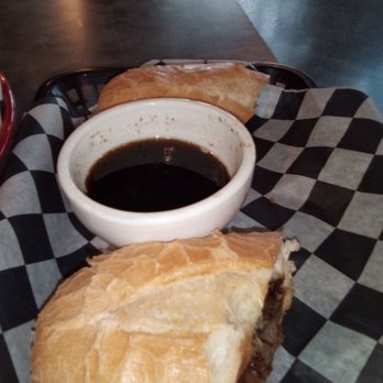 Iron Thunder Saloon - a sandwich and a bowl of sauce - Sports Bars Near Me - Mooresville, North Carolina Iron Thunder Saloon - a sandwich and a bowl of sauce - Sports Bars Near Me - Mooresville, North Carolina