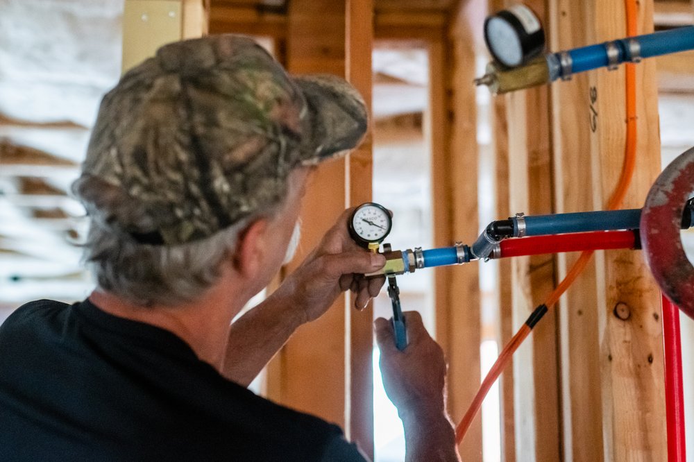 Slide of Three Sisters Plumbing