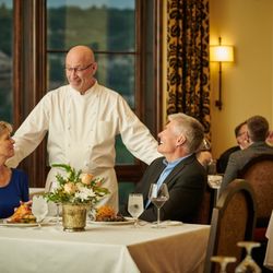 Ravenna Country Club - Ravenna Country CLub DIning Area with couple being served