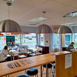 A&W - The interior dining room is airy and very clean, with those exterior tables only usable at limited times during the year