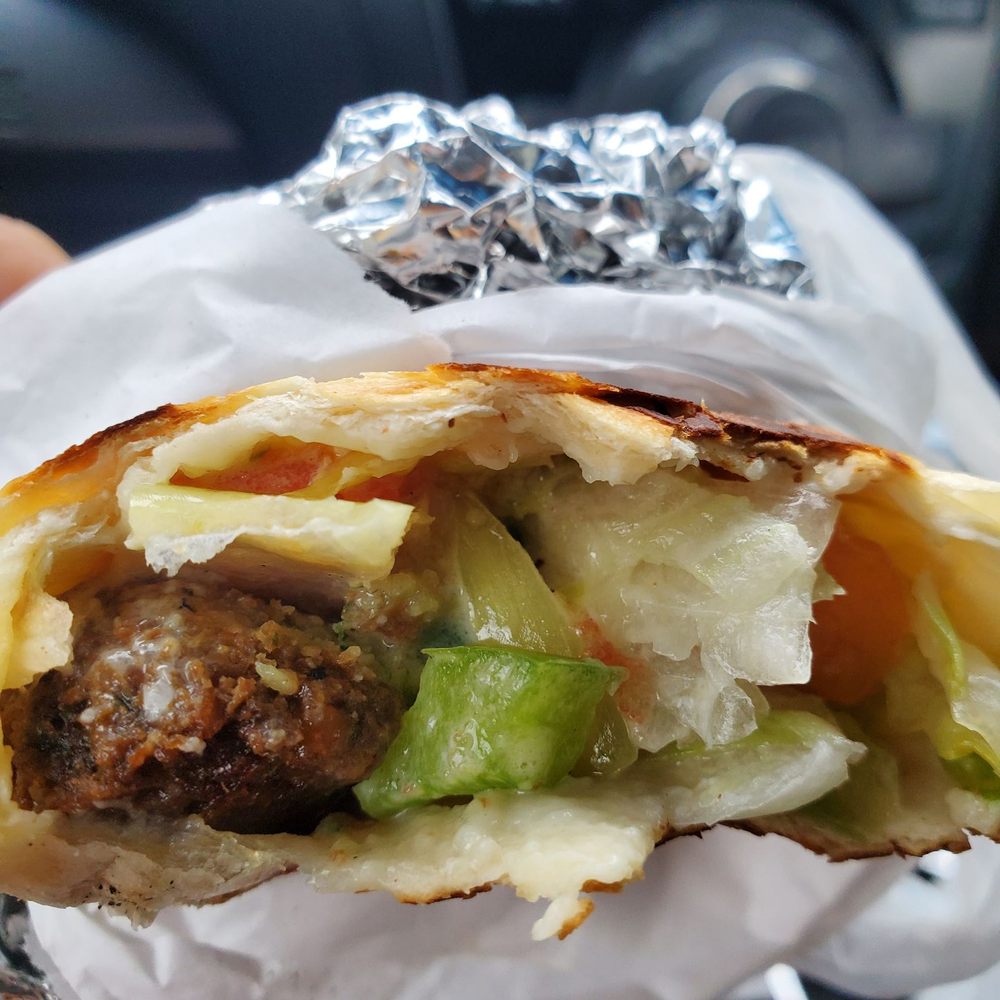 Kenz - He added green peppers.  I didn't want any. - Mediterranean Near Me - Houston, Texas