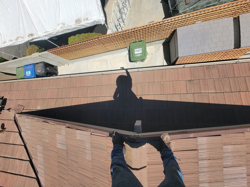 Slide of R Squared Roofing Services