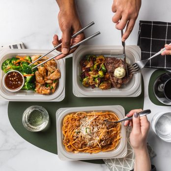 Snap Kitchen-Skillman - two people eating a meal with chopsticks - Gluten-Free Near Me - Dallas, Texas Snap Kitchen-Skillman - two people eating a meal with chopsticks - Gluten-Free Near Me - Dallas, Texas