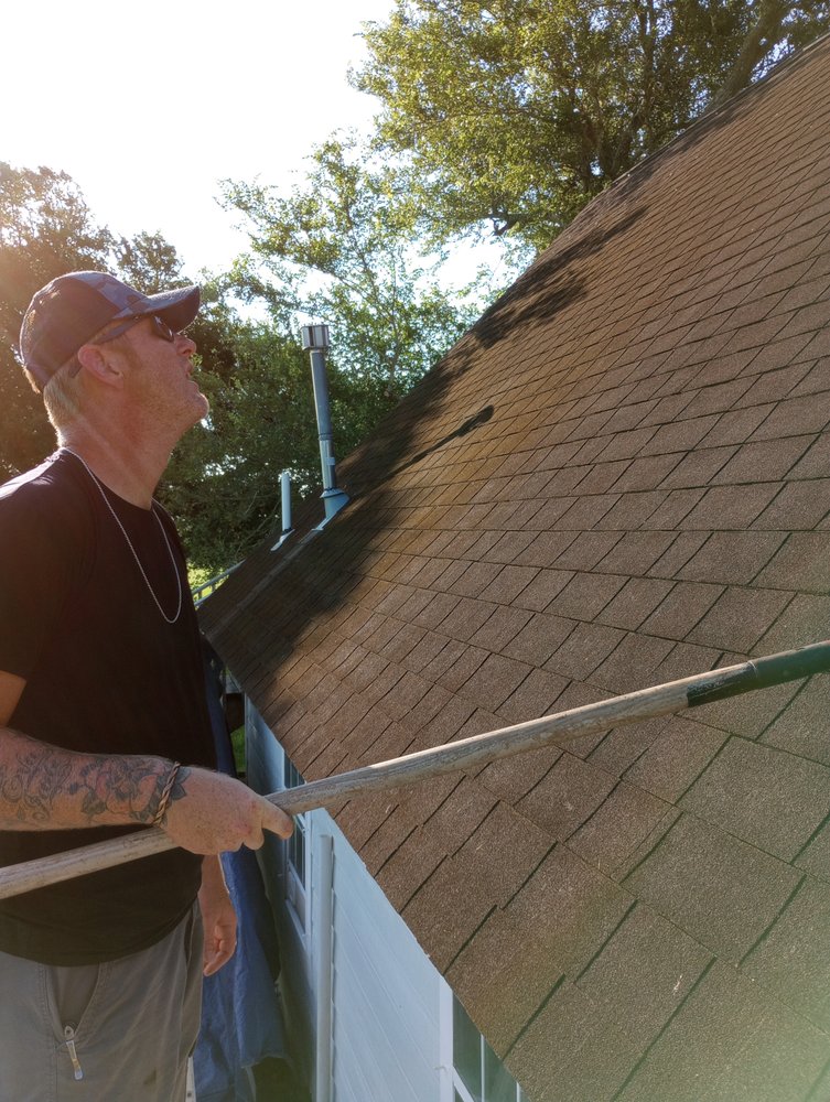 Slide of Lion Roofing