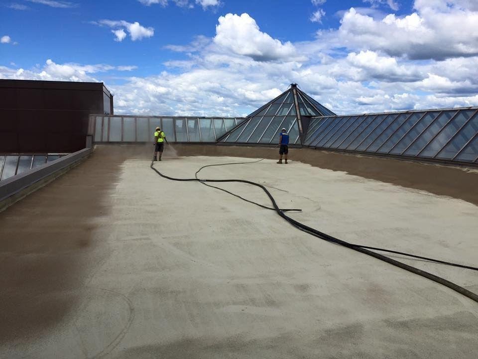 Slide of Tip Top Roofing