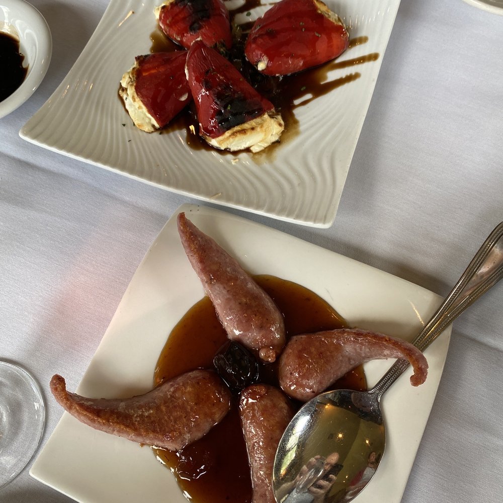 Café Madrid - Butifarritas con and goat cheese peppers - Spanish Near Me - Holladay, Utah Café Madrid - Butifarritas con and goat cheese peppers - Spanish Near Me - Holladay, Utah