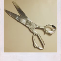 These aren't your usual hair scissors! These are on our walls. Come in and see!