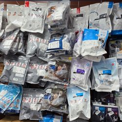 Binson's Medical Equipment and Supplies - Close-up photo of a wall display at the Dearborn store, densely packed with hanging, packaged CPAP masks and accessories.
