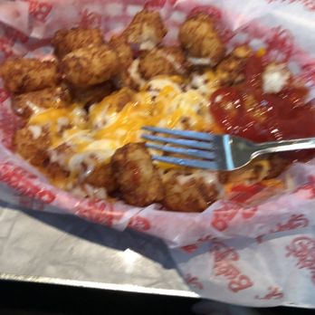 Bubba's 33 - Burnt tater tots with a sprinkle of cheese - Burgers Near Me - Longview, Texas