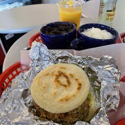 Arepa with an order of Rice and Beans Arepa with an order of Rice and Beans