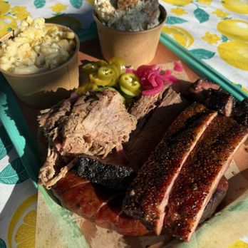 Botto's BBQ - potato salad, spicy mac n cheese, 3 meats combo: ribs, brisket, and pulled pork, added one sausage link - Barbeque Near Me - Portland, Oregon Botto's BBQ - potato salad, spicy mac n cheese, 3 meats combo: ribs, brisket, and pulled pork, added one sausage link - Barbeque Near Me - Portland, Oregon