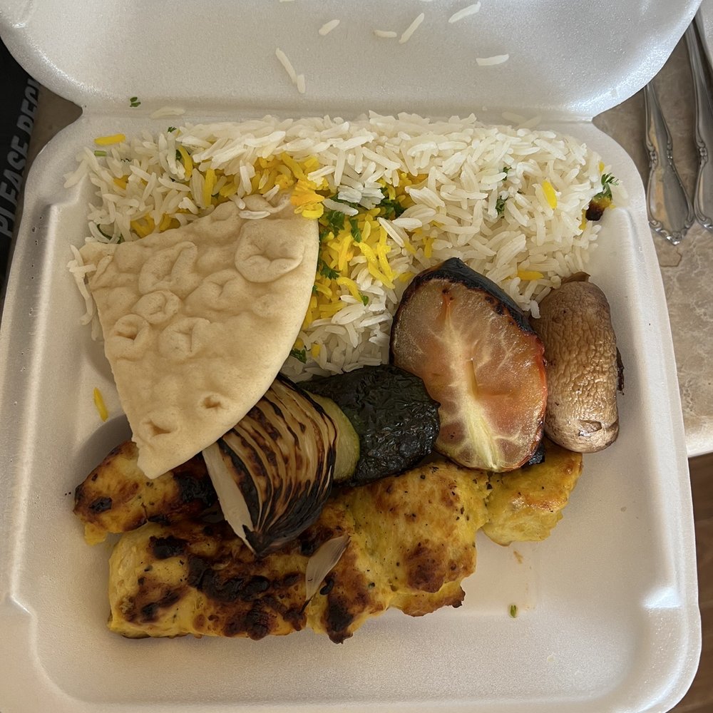 Mediterranean Bistro - Chicken kebab with rice, Looks better than it tasted. - Mediterranean Near Me - Omaha, Nebraska Mediterranean Bistro - Chicken kebab with rice, Looks better than it tasted. - Mediterranean Near Me - Omaha, Nebraska