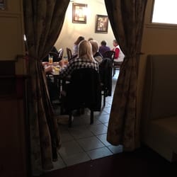 The Brass Lantern Restaurant & Lounge - This group of ladies are playing a rockin' game called Mahjongg!!! They gather at different places! It's a vibrant game.