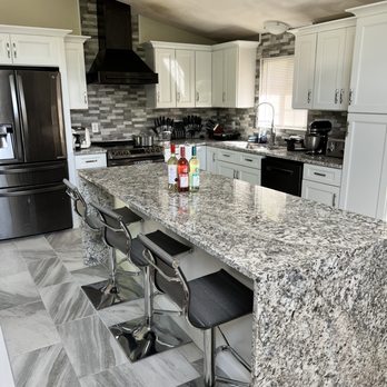Brylyn Construction - a kitchen with granite countertops - General Contractors Near Me